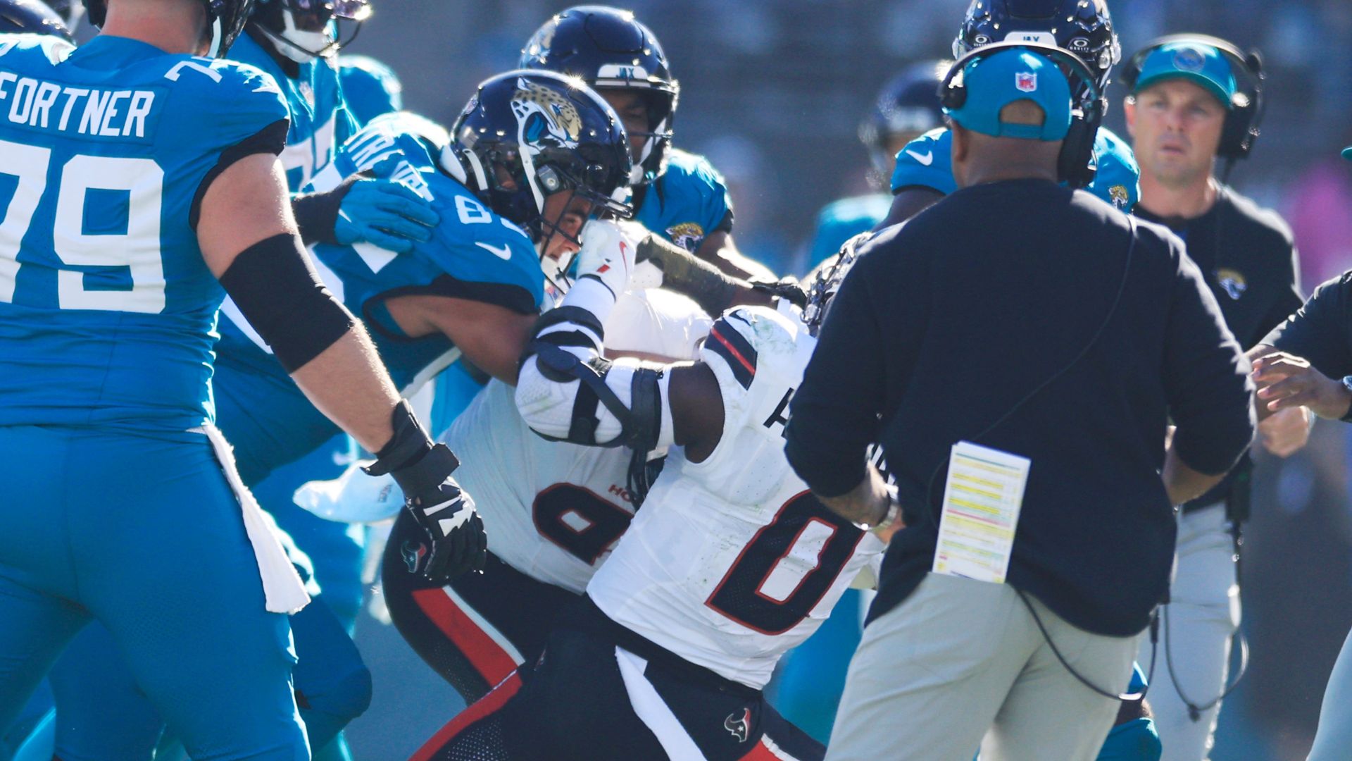 Dirty Late Hit Ignites On-Field Fight, Fans Throw Trash At Ejected Texan [WATCH]